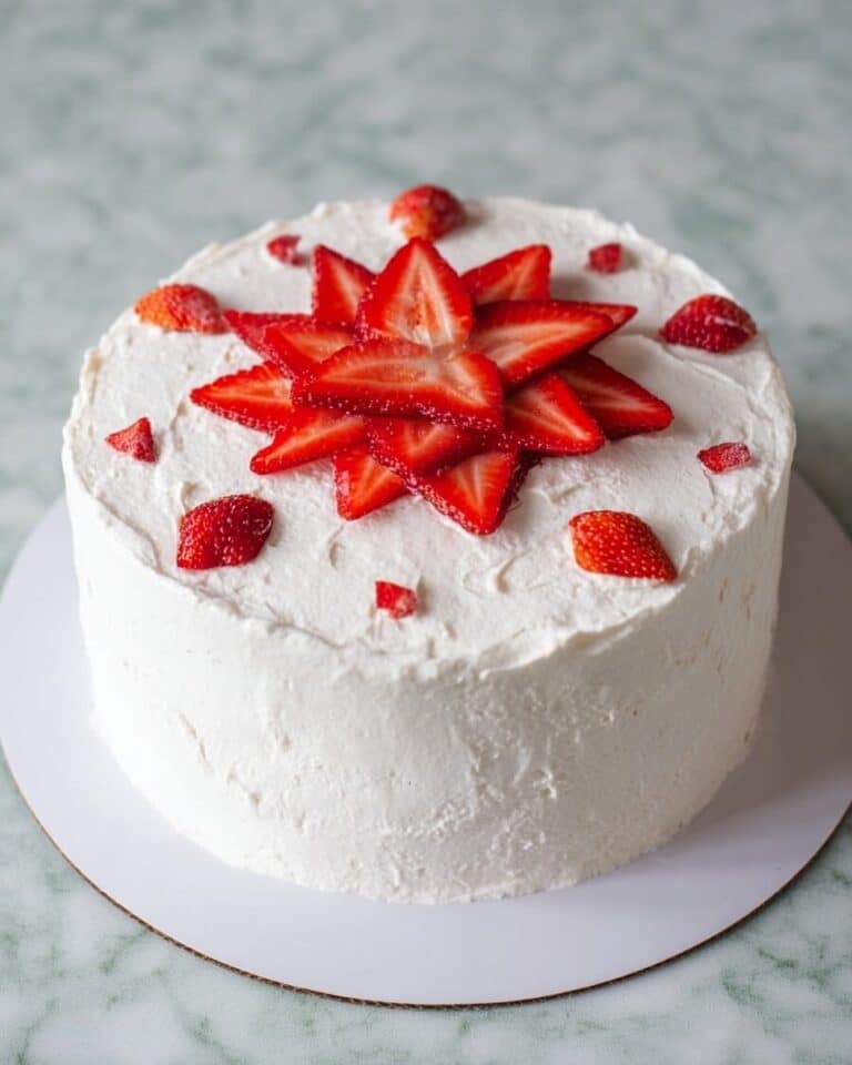 Strawberry Cake with Cream Cheese Frosting and Fresh Strawberry Garnish Recipe