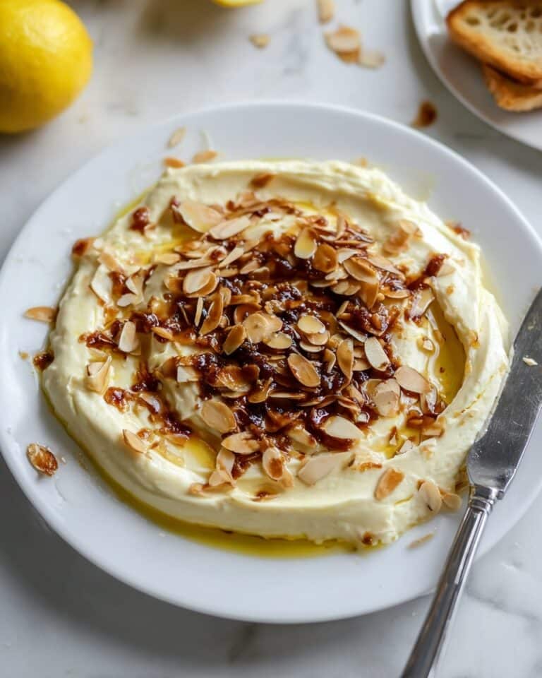 Whipped Brie with Honey, Chili Crisps, and Almonds Recipe
