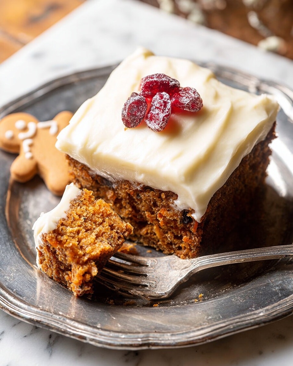 A square piece of moist, brown carrot cake with visible texture and bits inside sits on a vintage silver plate placed on a white marbled surface. The cake has a thick, smooth layer of off-white cream cheese frosting spread on top, decorated with a single red sugared cranberry in the center. A fork holds a bite-sized piece of the cake, showing the inside texture and a bit of frosting on it. There is a small gingerbread cookie shaped like a dog lying on the plate next to the cake. Photo taken with an iphone --ar 4:5 --v 7