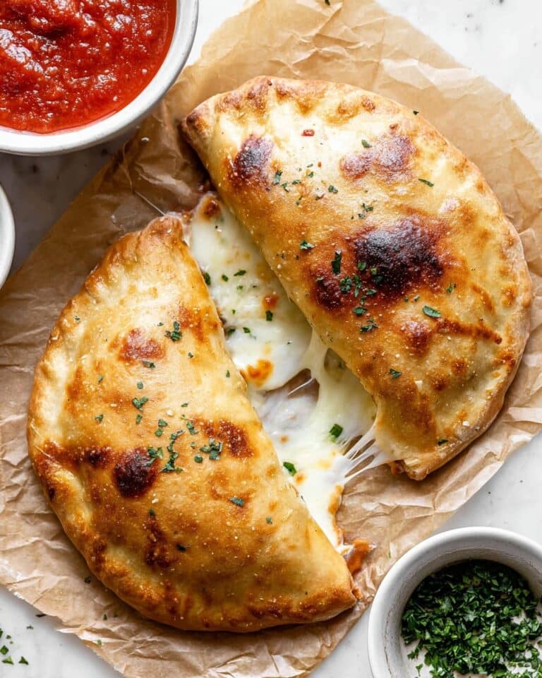 Cheesy Italian Sausage and Pepperoni Calzones Recipe